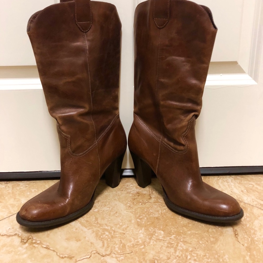 Real, soft, brown, leather cowboy boots.